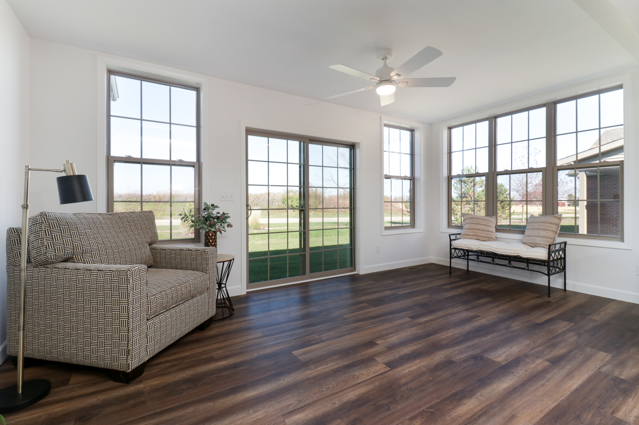 1332 Monterey Pine Drive Normal, IL 61761 - Photo 17 of 33 a living room with furniture and large windows