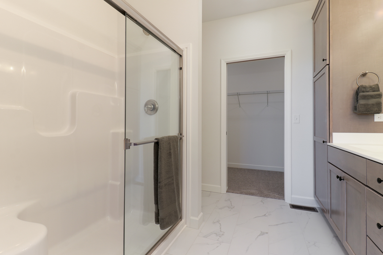 1332 Monterey Pine Drive Normal, IL 61761 - Photo 23 of 33 a bathroom with a shower and a sink