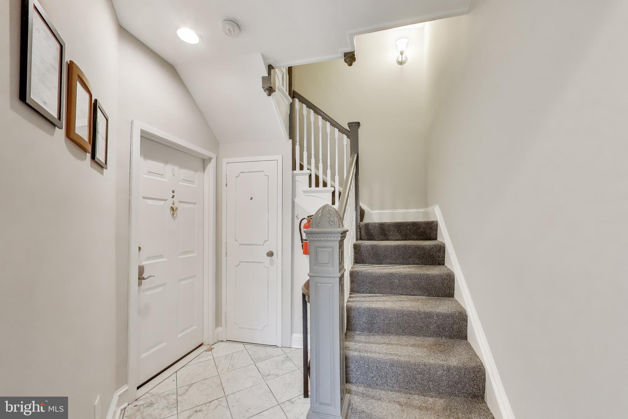 1724 21st Street Northwest, Unit 3 Washington, DC 20009 - Photo 12 of 17 a view of staircase with white walls and windows