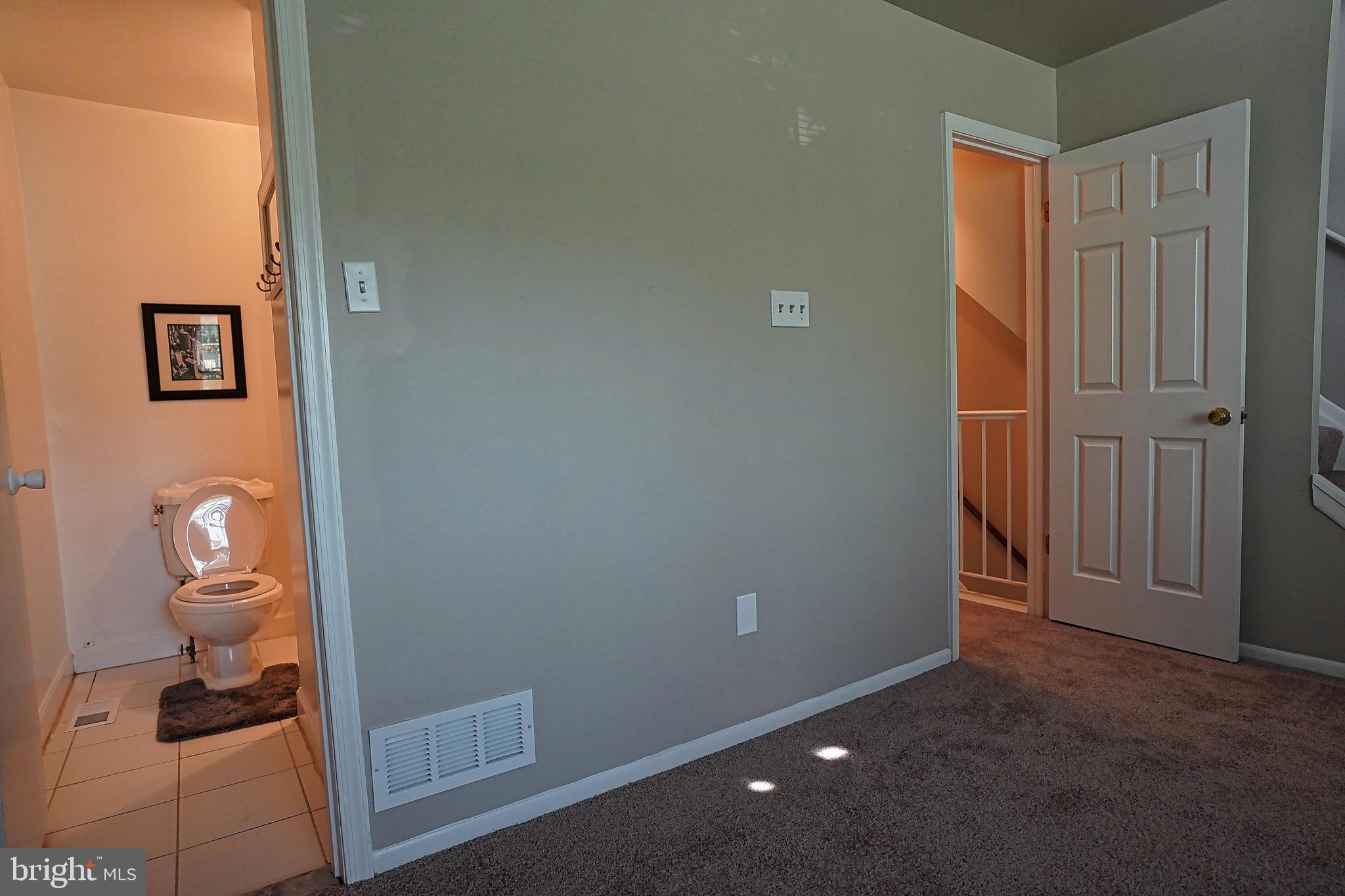 6948 Rockfield Road Baltimore, MD 21244 - Photo 35 of 47 a bathroom with a toilet