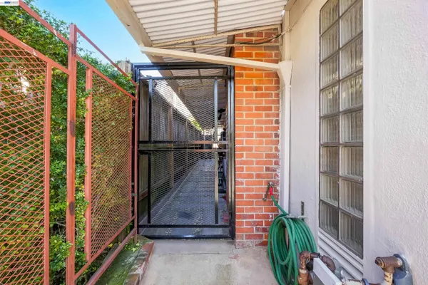 a view of a balcony with an outdoor space