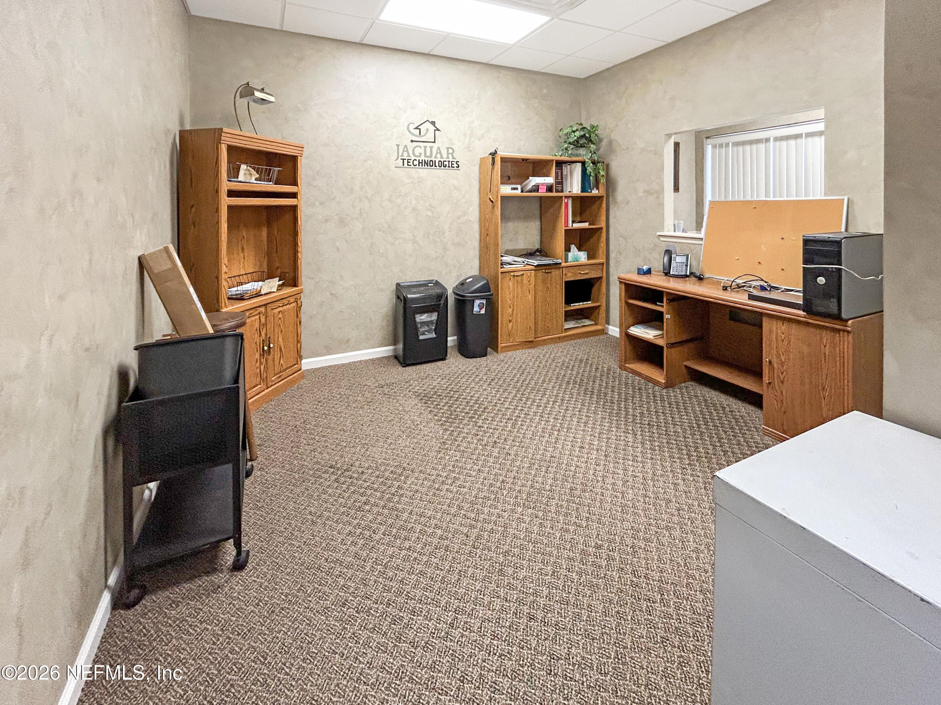 1635 Farm Way, Unit 402 Middleburg, FL 32068 - Photo 11 of 20 a room with furniture a air conditioner and a window