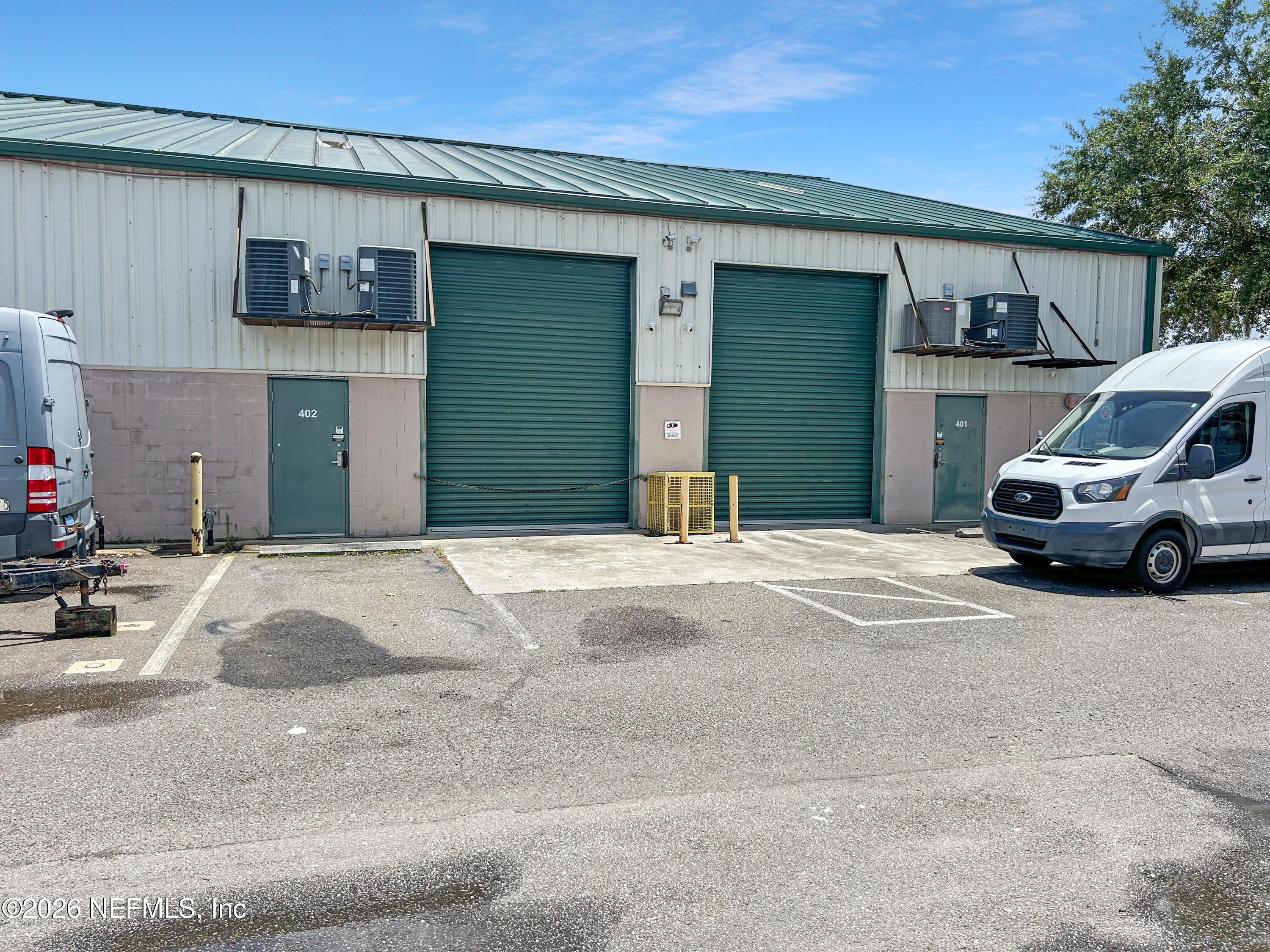 1635 Farm Way, Unit 402 Middleburg, FL 32068 - Photo 20 of 20 a front view of a house with a garage