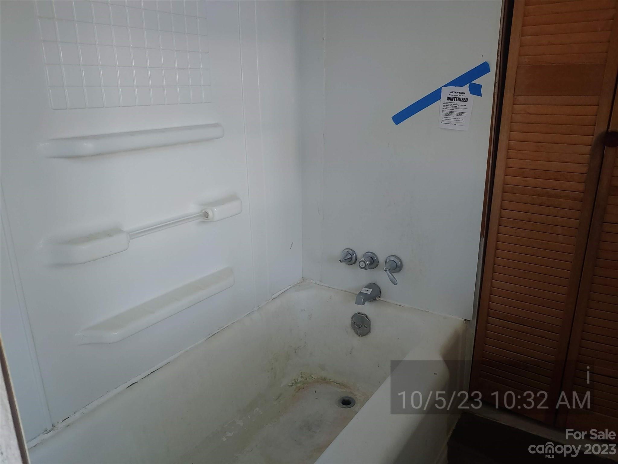 403 Vance Avenue Salisbury, NC 28144 - Photo 11 of 14 a bathroom with a bathtub