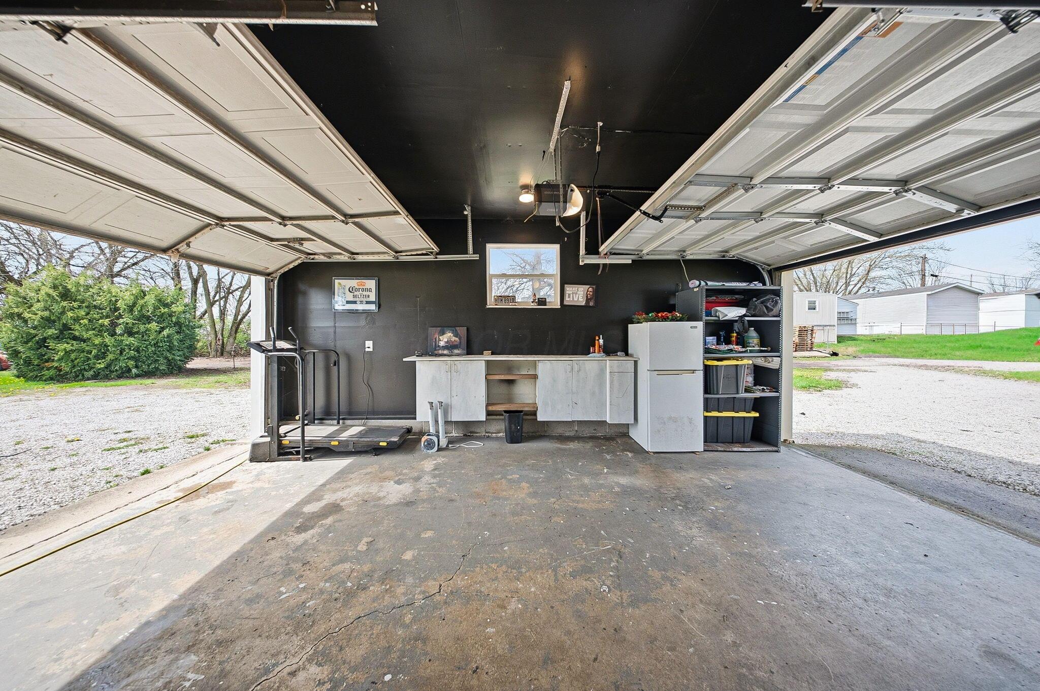 9891 Shepherd Road Lockbourne, OH 43137 - Photo 36 of 57 Drive thru attached garage rear & front opening doors