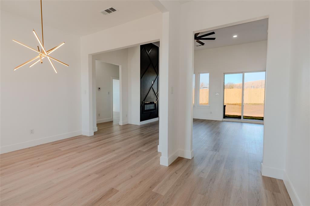 592 Highview Court Godley, TX 76044 - Photo 2 of 21 Functional flex space that easily adapts as a dining room, office, or creative workspace.
