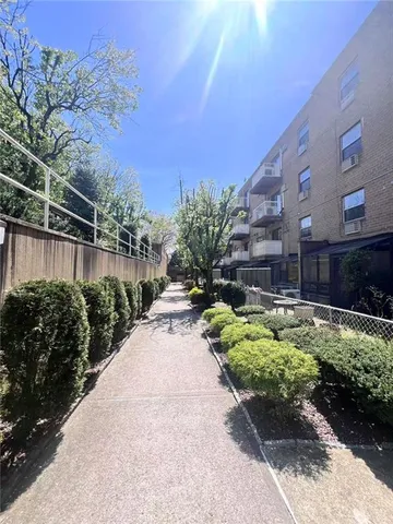 a view of a garden with pathway