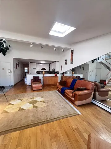 a bedroom with furniture and a view of bedroom