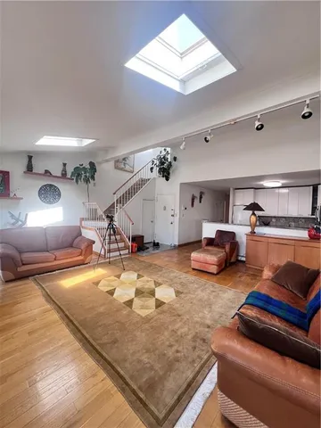 a room with furniture and a chandelier