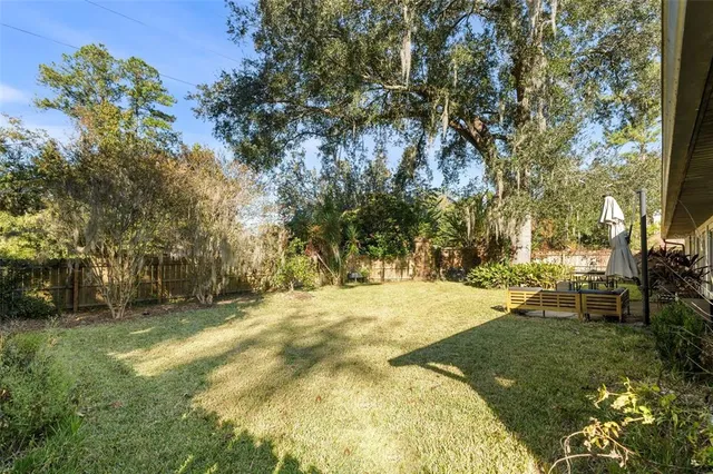 a view of yard with trees