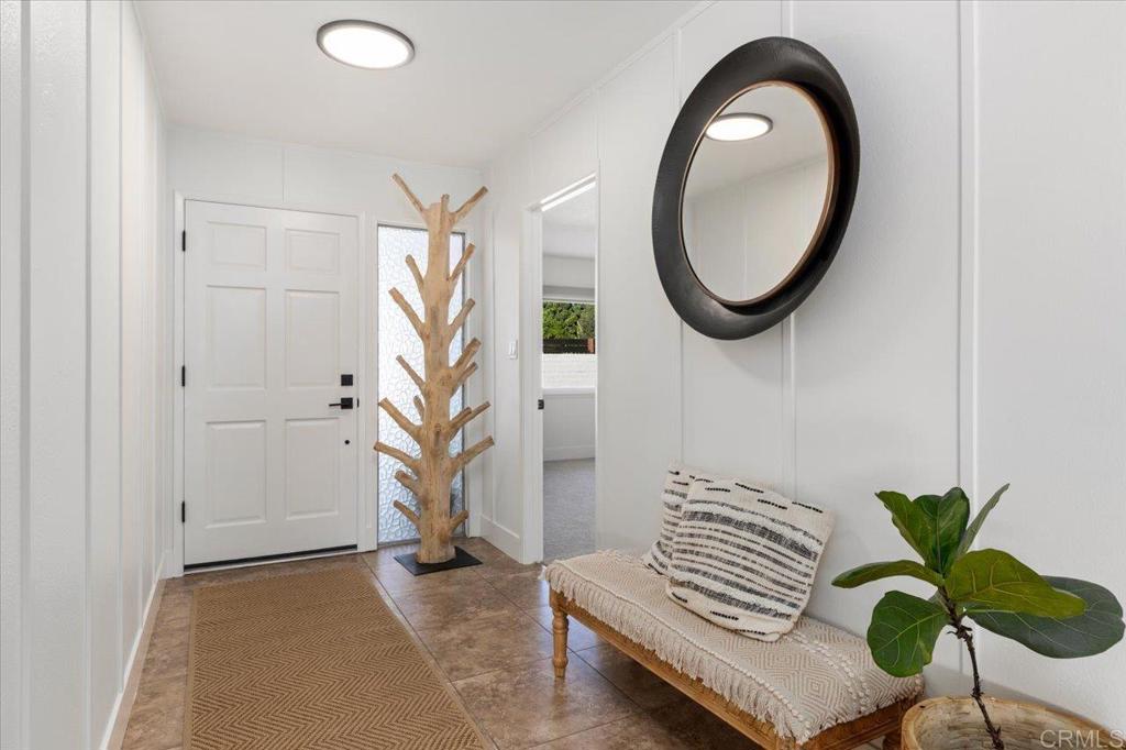 1267 Discovery Street San Marcos, CA 92078 - Photo 11 of 75 a view of a livingroom with furniture and a potted plant