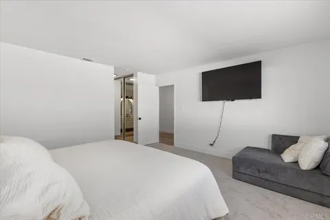 a dining room with furniture window and wooden floor