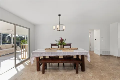 a kitchen with a stove and a refrigerator