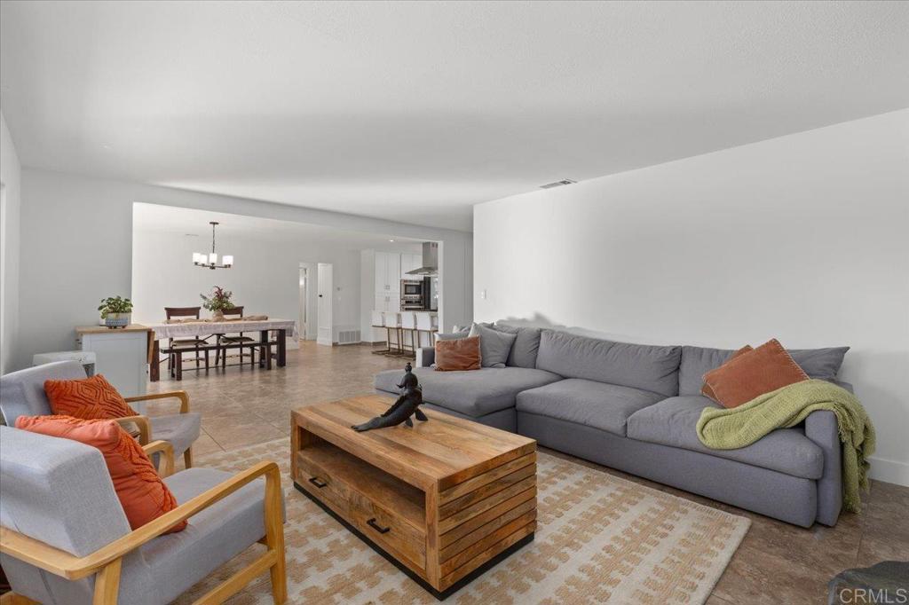 1267 Discovery Street San Marcos, CA 92078 - Photo 23 of 75 a living room with furniture and a table