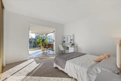 a view of a porch with a big yard