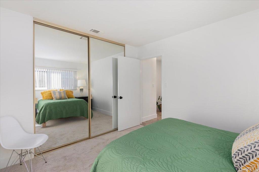 1267 Discovery Street San Marcos, CA 92078 - Photo 35 of 75 a bedroom with a bed and a couch