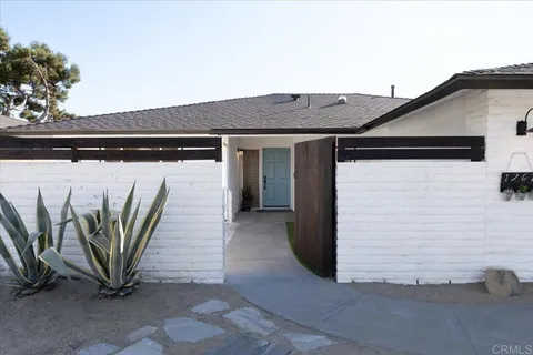 a picture of a table and chair in the patio