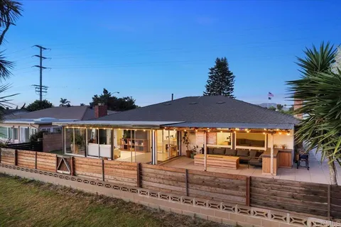 a view of a house with swimming pool
