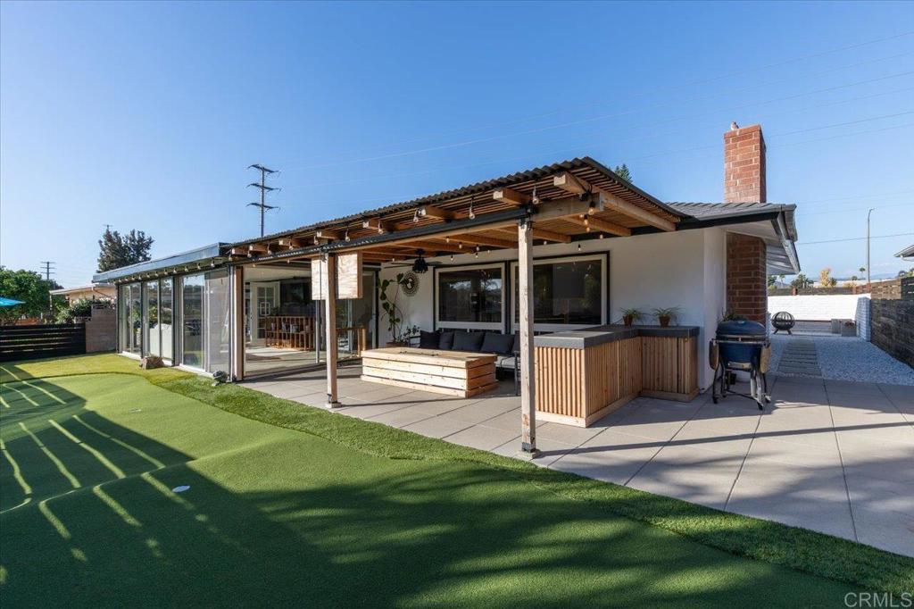 1267 Discovery Street San Marcos, CA 92078 - Photo 43 of 75 a view of a house with backyard porch and sitting area