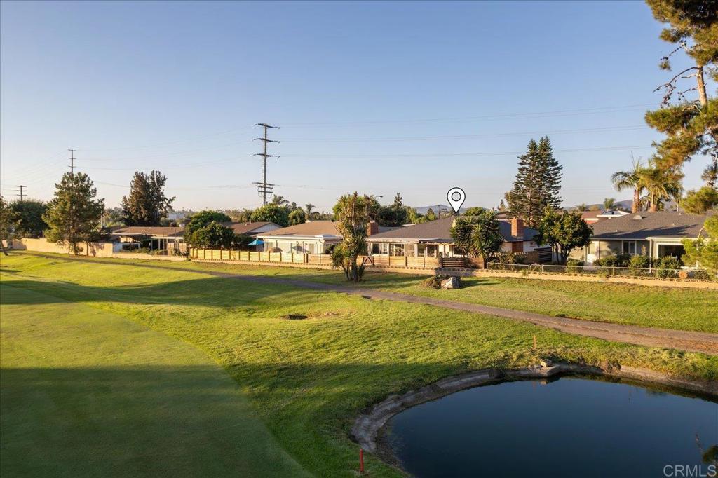 1267 Discovery Street San Marcos, CA 92078 - Photo 61 of 75 a view of an ocean building and trees in the background