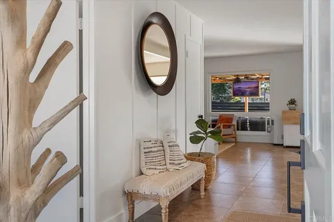 a bathroom with a double vanity sink mirror and