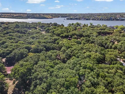 an aerial view of a house with a garden