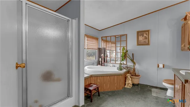 a kitchen with lots of counter top space and appliances