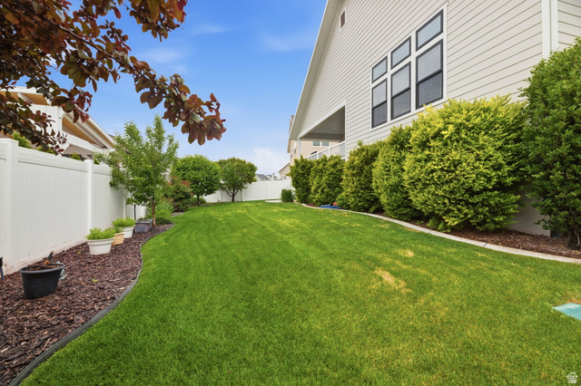 2109 Sunflower Lane Mapleton, UT 84664 - Photo 42 of 43 Backyard w/Covered Deck & Basement Entrance & Professional Landscaping