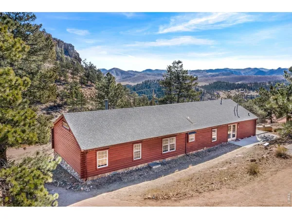 a view of a terrace with a forest