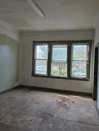 an empty room with a window