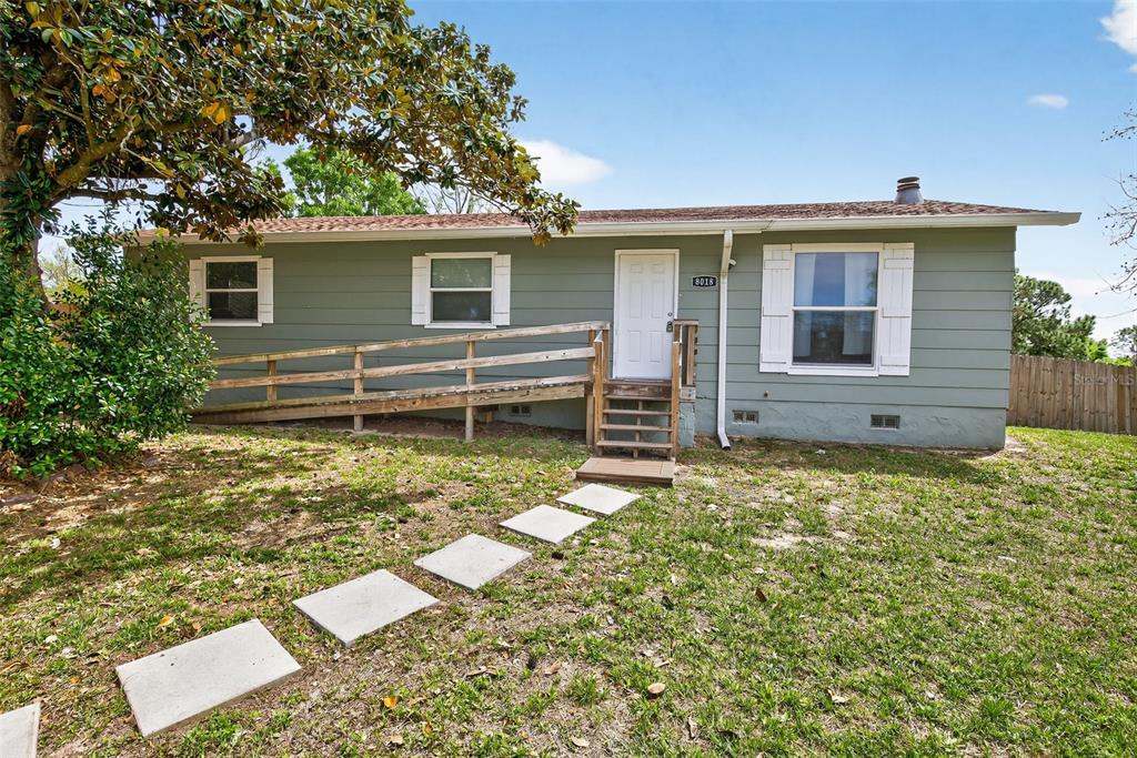 8018 Grovemont Estates Road Groveland, FL 34736 - Photo 1 of 1 front view of a house with a large window