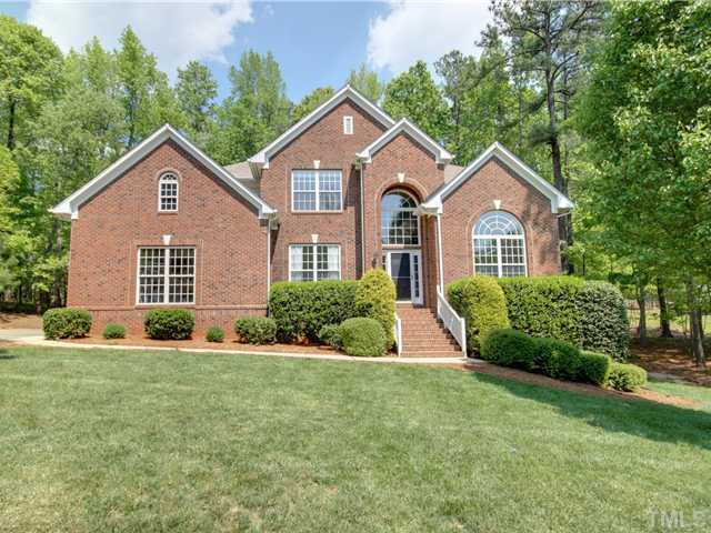 5029 Bartons Enclave Lane Raleigh, NC 27613 - Photo 1 of 25 a front view of a house with a yard