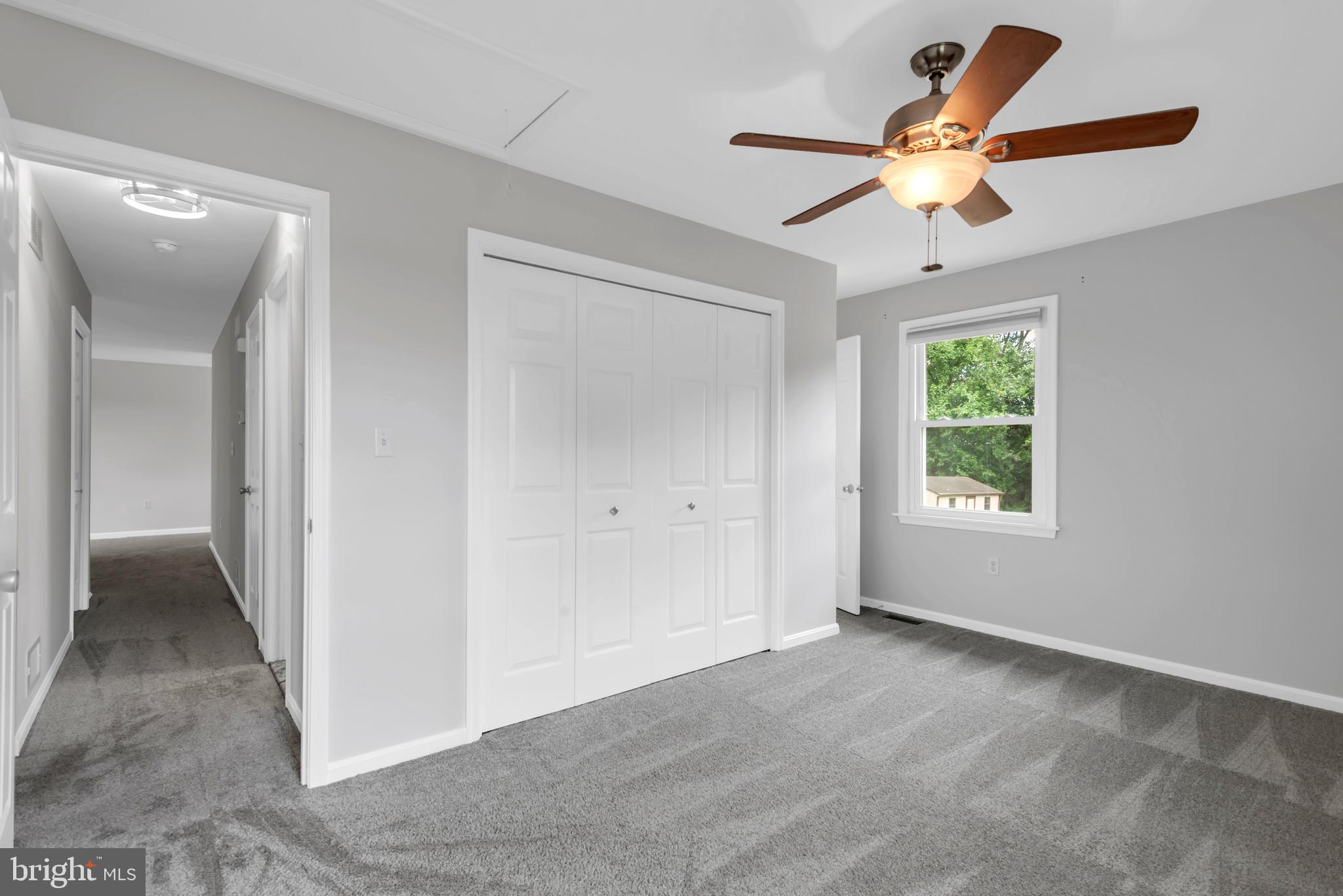 644 Jasontown Road Westminster, MD 21158 - Photo 16 of 36 wooden floor in an empty room with a window