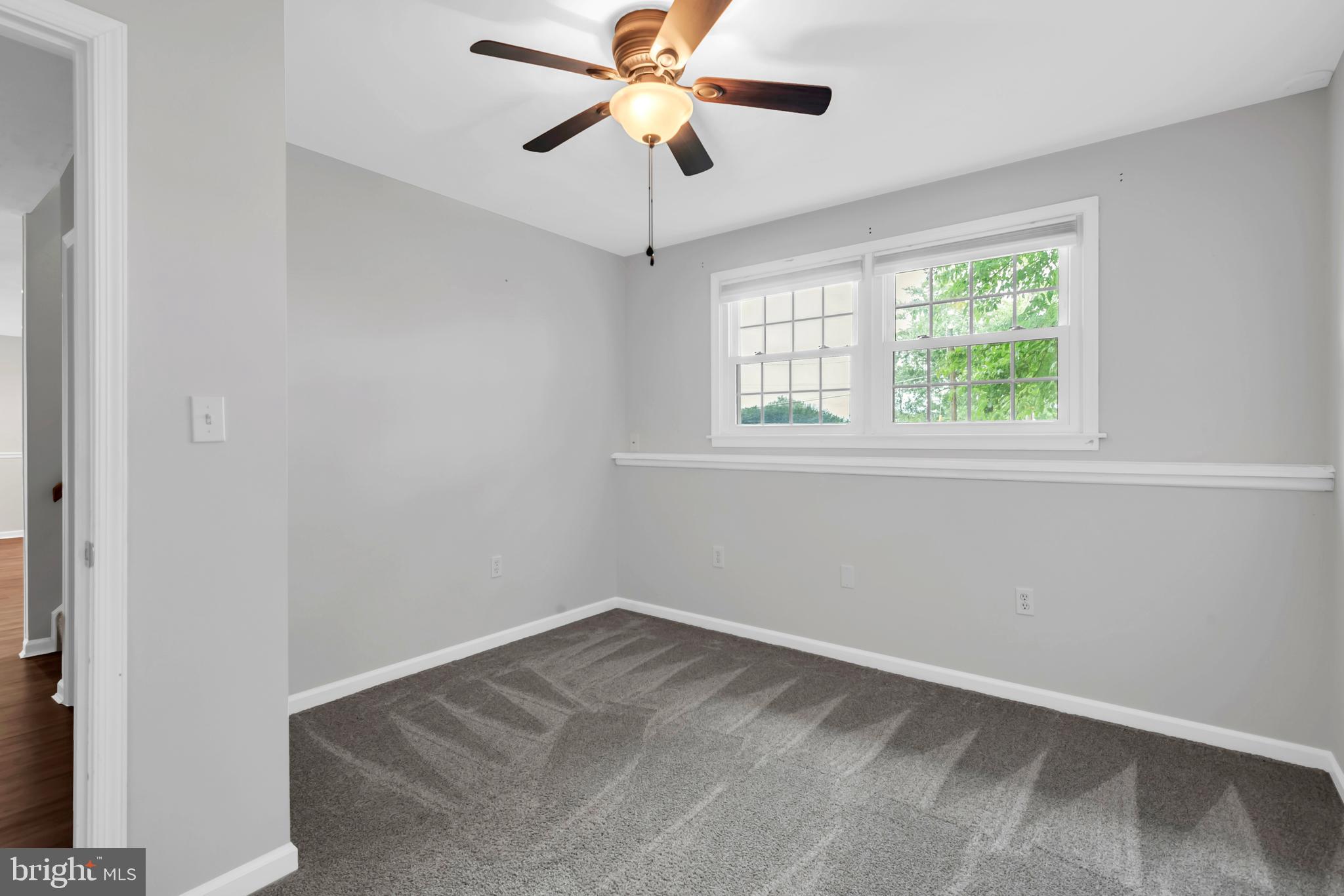 644 Jasontown Road Westminster, MD 21158 - Photo 31 of 36 an empty room with a window and a fan