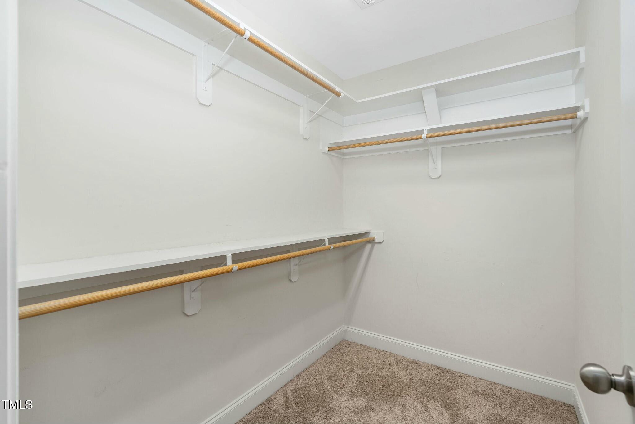 1052 Monmouth Loop Cary, NC 27513 - Photo 21 of 37 a view of a room with shelf