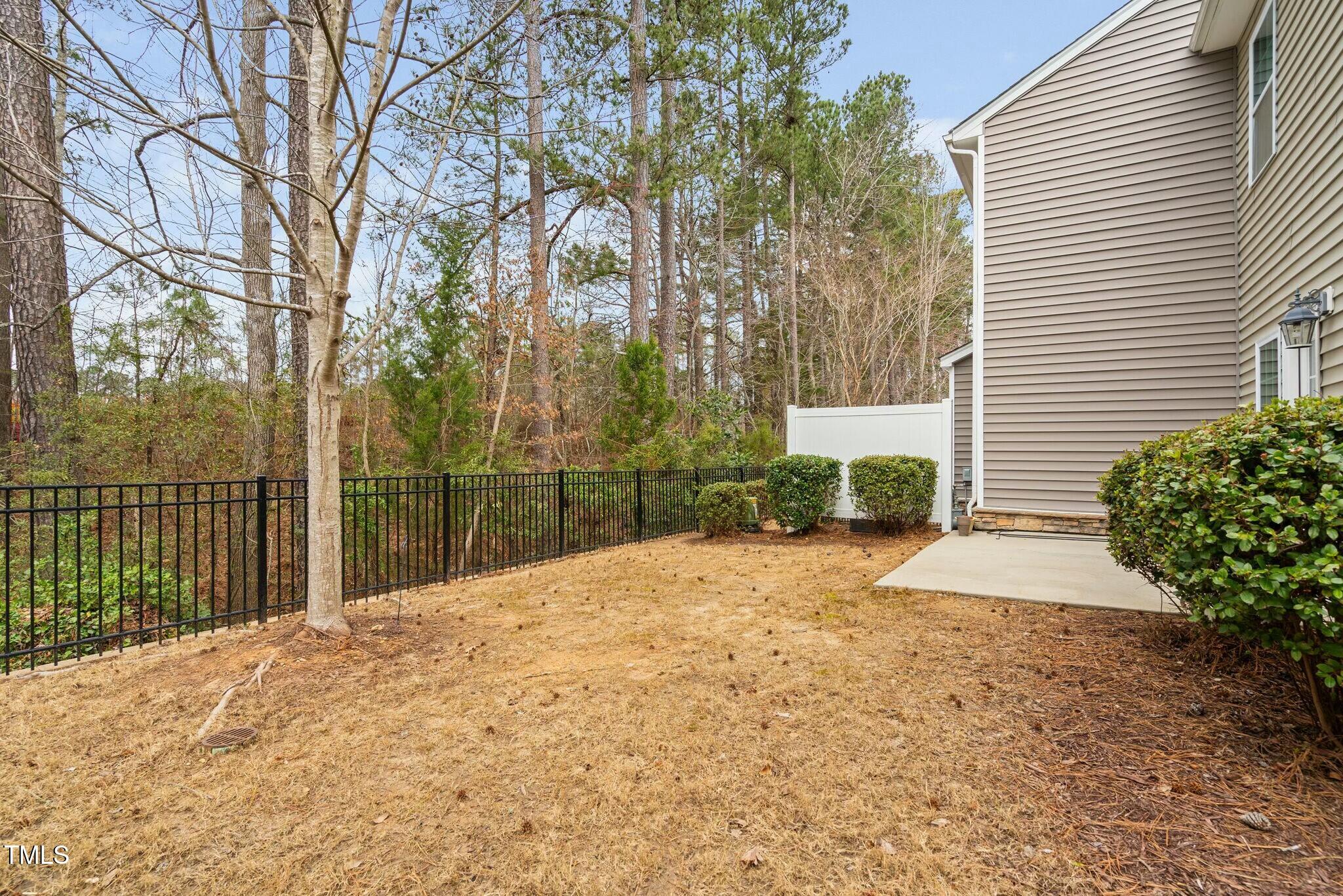 1052 Monmouth Loop Cary, NC 27513 - Photo 33 of 37 a view of a backyard of the house