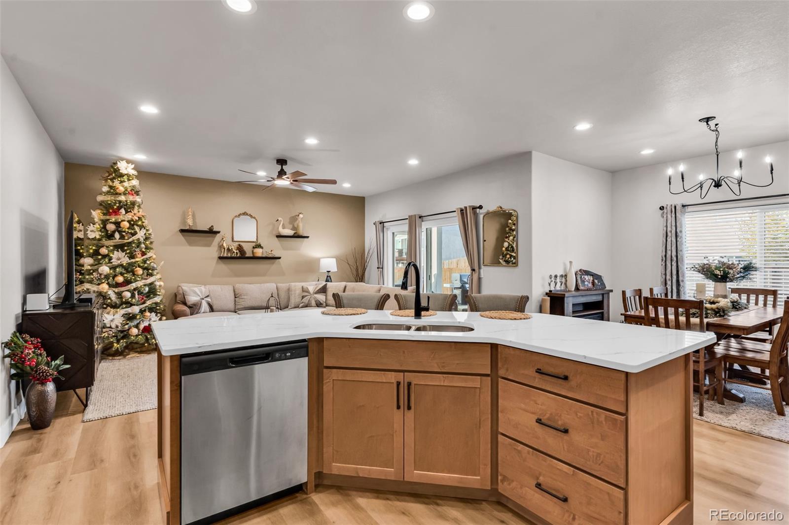425 Miners Road Canon City, CO 81212 - Photo 16 of 33 a kitchen with sink stove and cabinets
