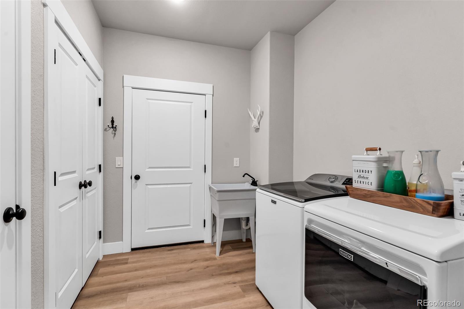 425 Miners Road Canon City, CO 81212 - Photo 28 of 33 a view of a livingroom with furniture and wooden floor