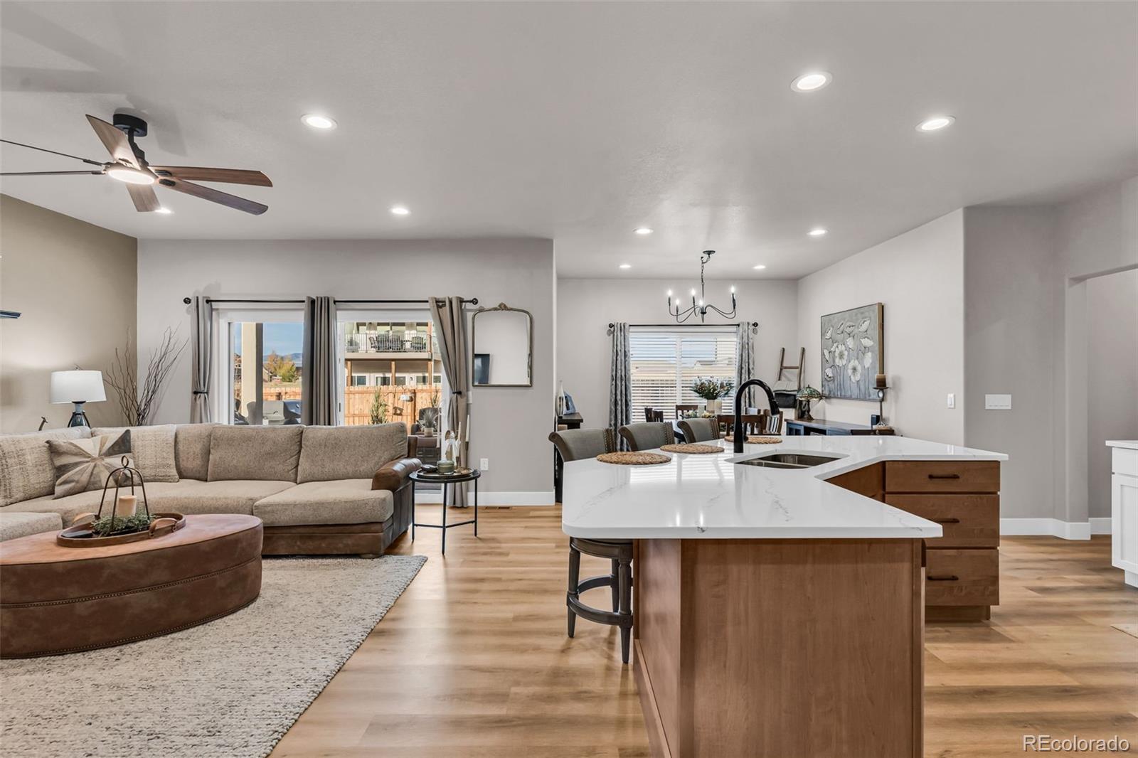 425 Miners Road Canon City, CO 81212 - Photo 8 of 33 a living room with furniture kitchen view and a wooden floor