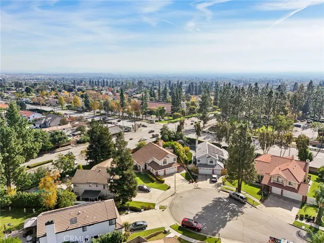 an aerial view of a city with lots of residential buildings