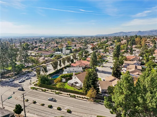 an aerial view of residential building and lake