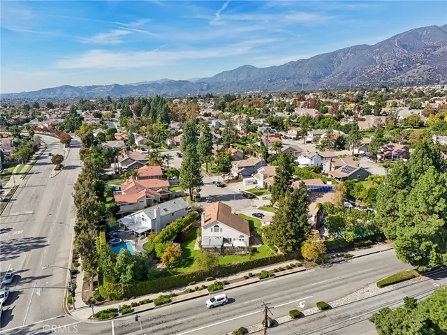 an aerial view of residential building and street