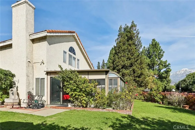 a front view of a house with a garage