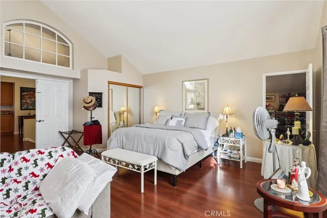 a bedroom with bed and a dresser