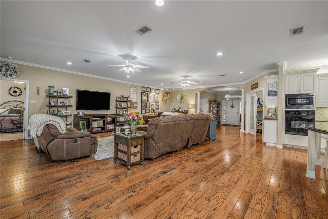 7 Hickory Ridge Lane Hilltop Lakes, TX 77871 - Photo 12 of 37 a living room with furniture and a flat screen tv
