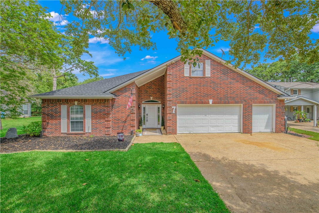 7 Hickory Ridge Lane Hilltop Lakes, TX 77871 - Photo 2 of 37 a front view of house with yard and green space