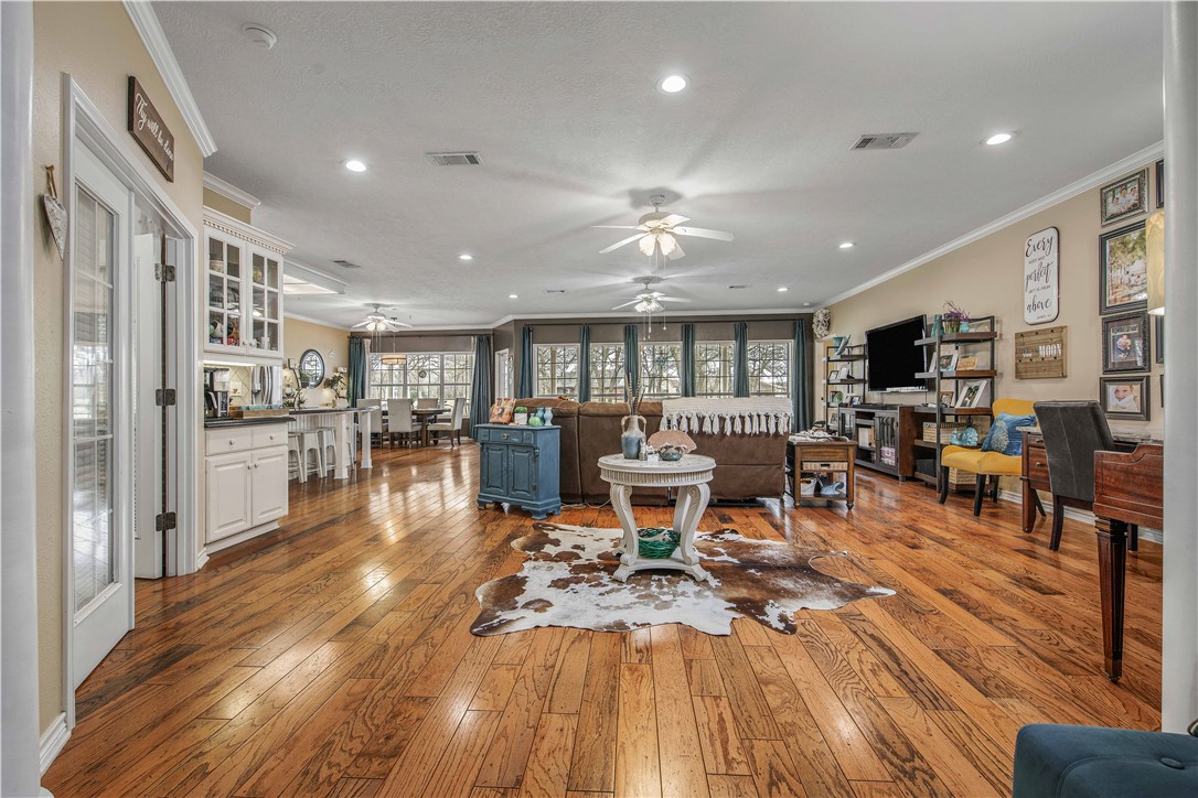7 Hickory Ridge Lane Hilltop Lakes, TX 77871 - Photo 7 of 37 a living room with lots of furniture and kitchen view