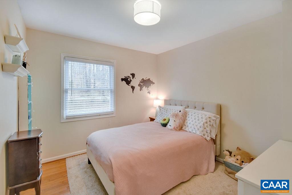 101 Vincennes Road Charlottesville, VA 22911 - Photo 13 of 31 a bedroom with a bed and a window