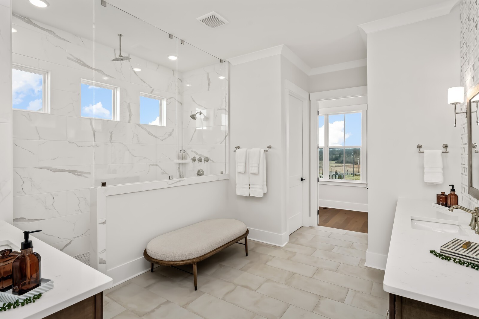 7280 Ruzek Court Fairview, TN 37062 - Photo 48 of 90 a spacious bathroom with a sink a toilet a mirror and shower