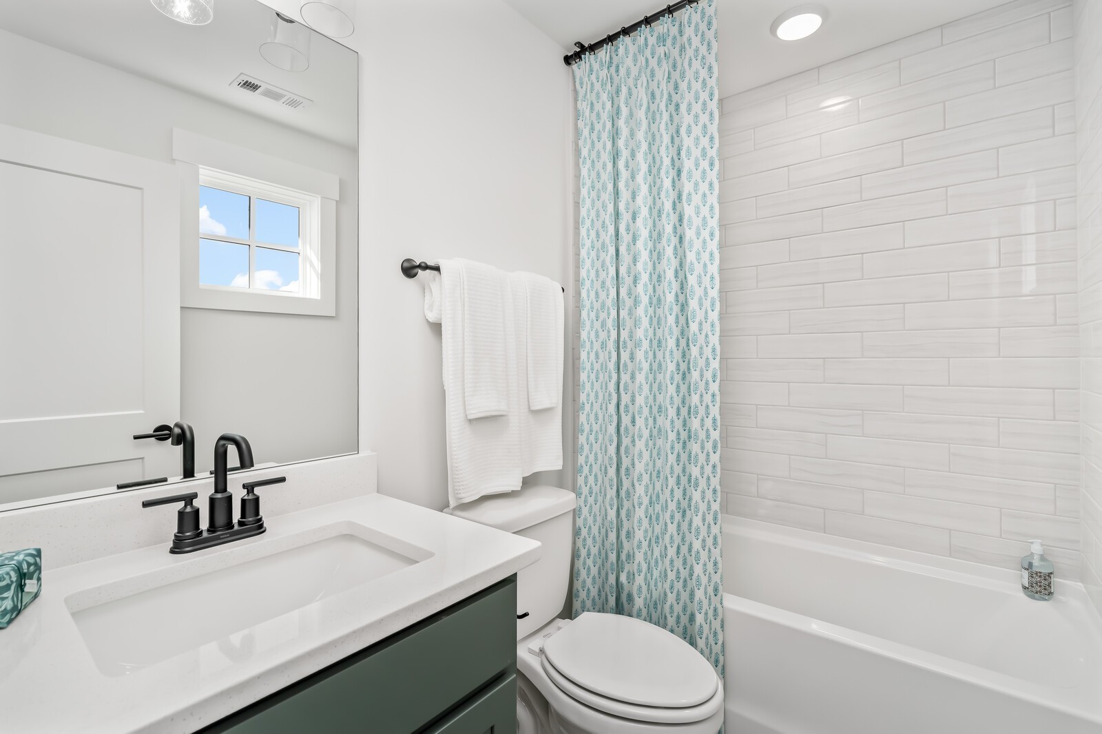 7280 Ruzek Court Fairview, TN 37062 - Photo 74 of 90 a bathroom with a sink a toilet and shower